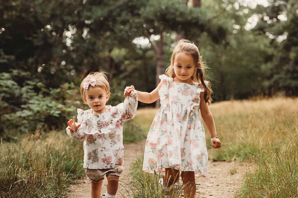 sisters holding hands summer photo shoot ipswich photographer