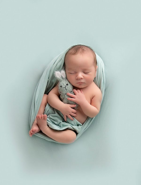 newborn photography ipswich baby with bunny mint green