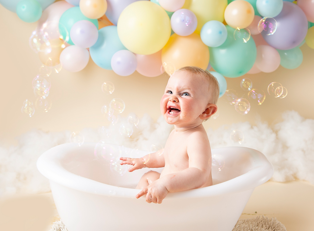 cake smash photographer ipswich pastel rainbow balloon girl 1st birthday 6