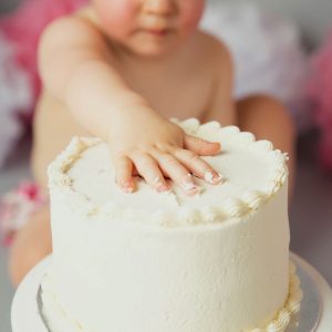 cake smash hand on cake